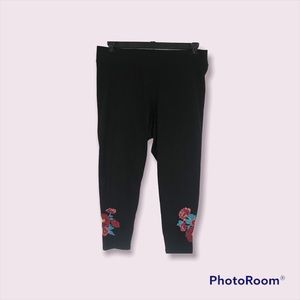 LOT OF TWO TORRID STRETCHY CAPRI PANTS/LEGGINGS - RED AND BLACK